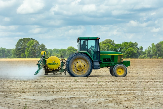 spraying pesticide